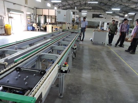 Long modular conveyor line under assembly at the Penta Automation facility